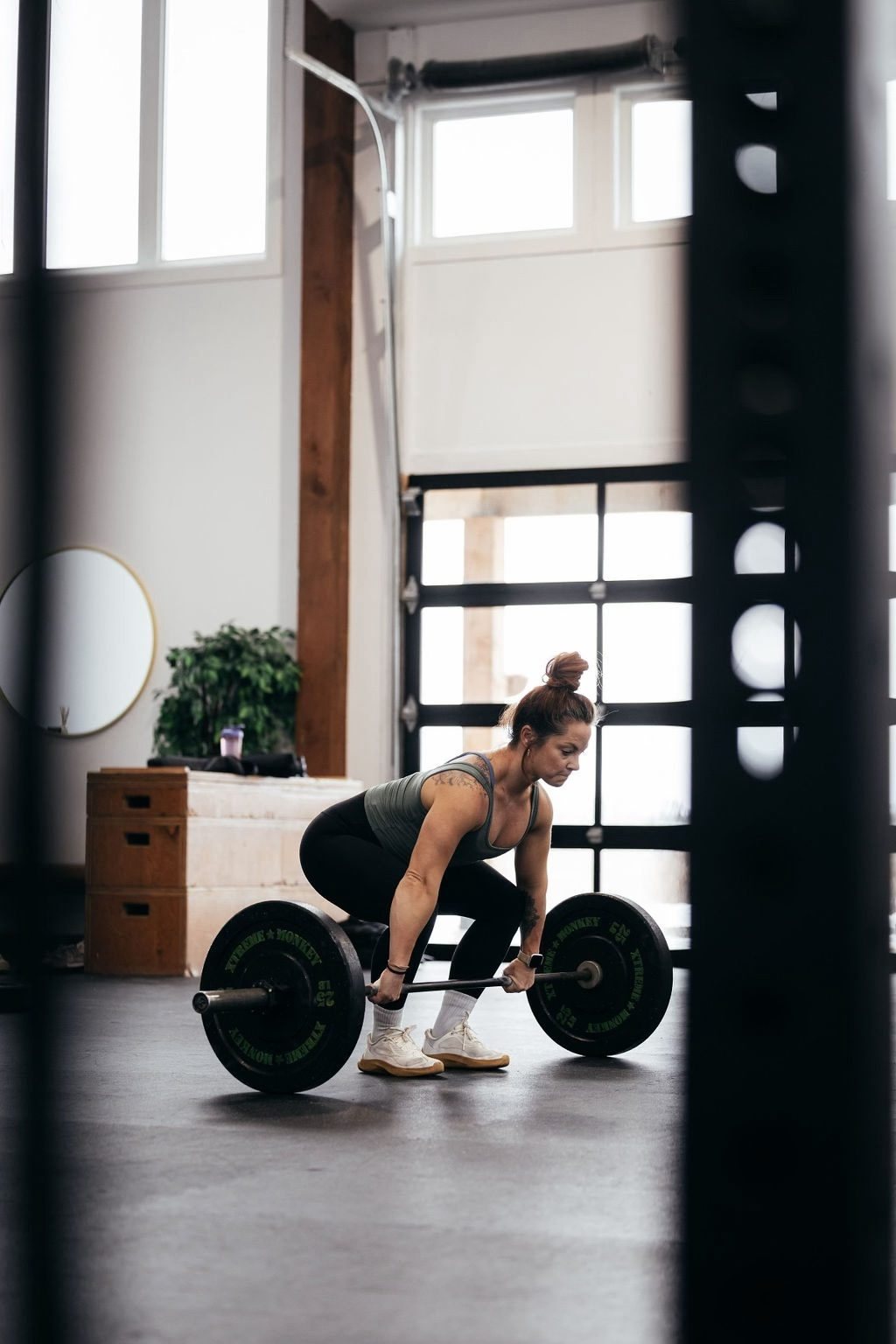 Ashley deadlifting in Fit Collective Studio