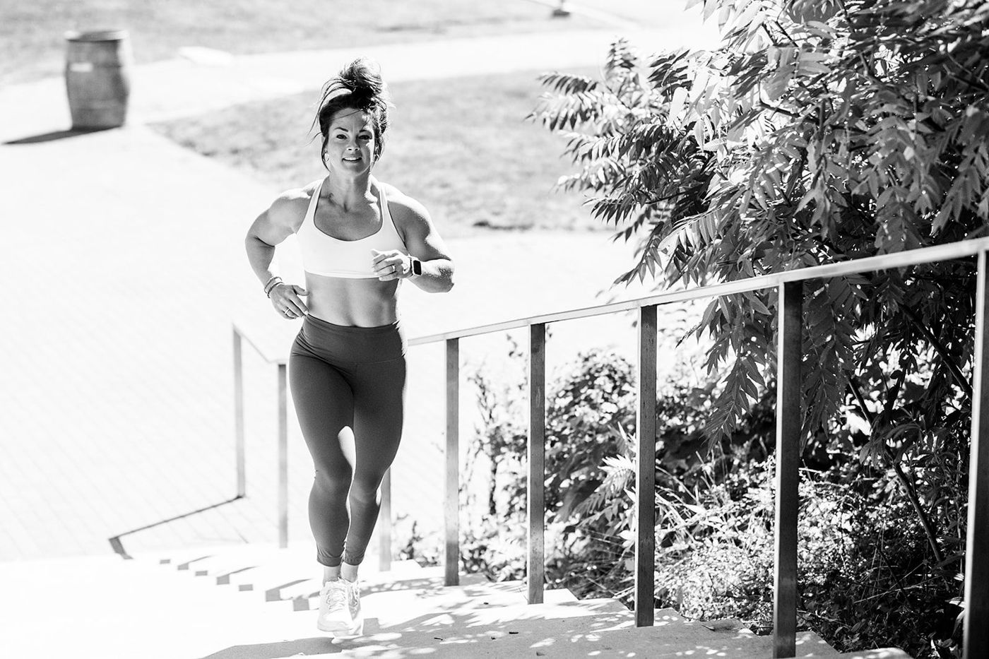 Ashley running up outdoor steps